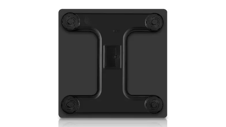 Back view of the wireless weight scale with four black feet and a central battery compartment Back view of the wireless weight scale with four black feet and a central battery compartment