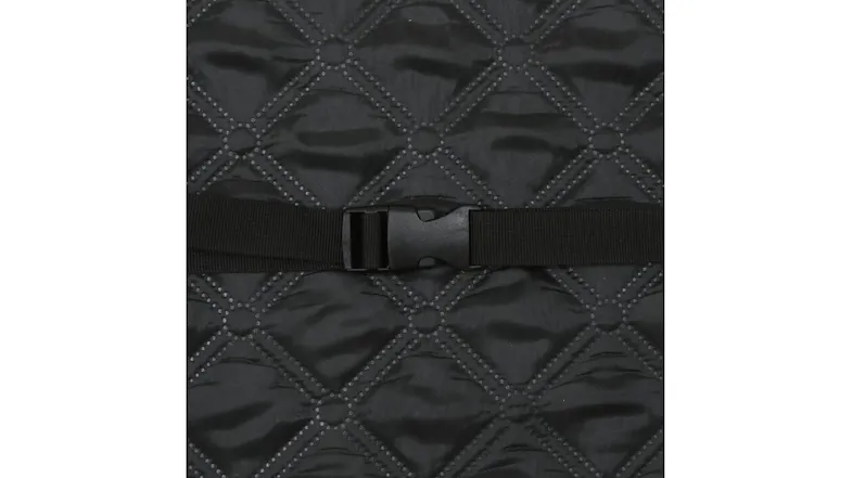 A detailed shot of the dog car seat cover’s quilted material with an adjustable buckle strap across the centre A detailed shot of the dog car seat cover’s quilted material with an adjustable buckle strap across the centre