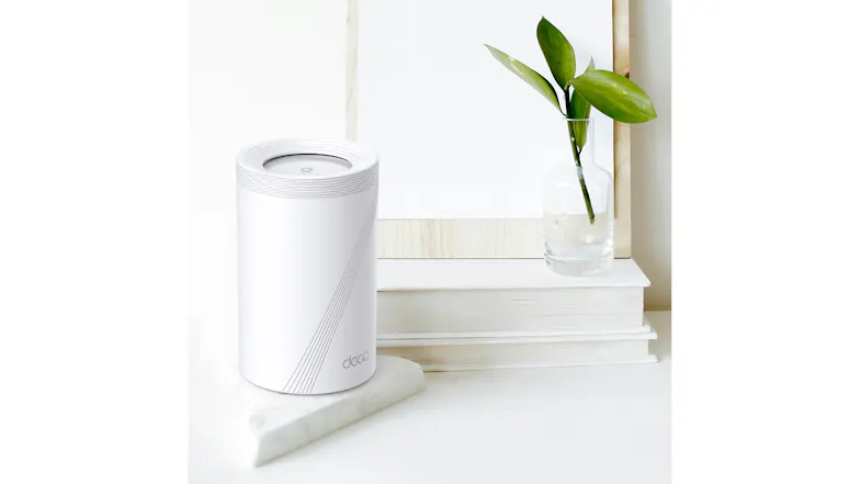 A view of the TP-Link Deco router in a modern, minimalist home decor setting. A view of the TP-Link Deco router in a modern, minimalist home decor setting.
