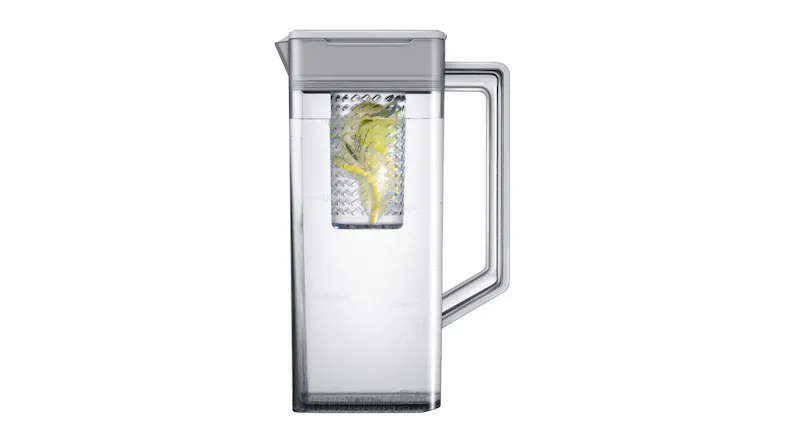 A glass pitcher with an internal fruit infuser A glass pitcher with an internal fruit infuser