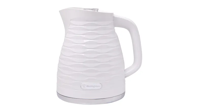 A front view of the white Westinghouse 1.7L electric kettle with a wave‑pattern textured body A front view of the white Westinghouse 1.7L electric kettle with a wave‑pattern textured body