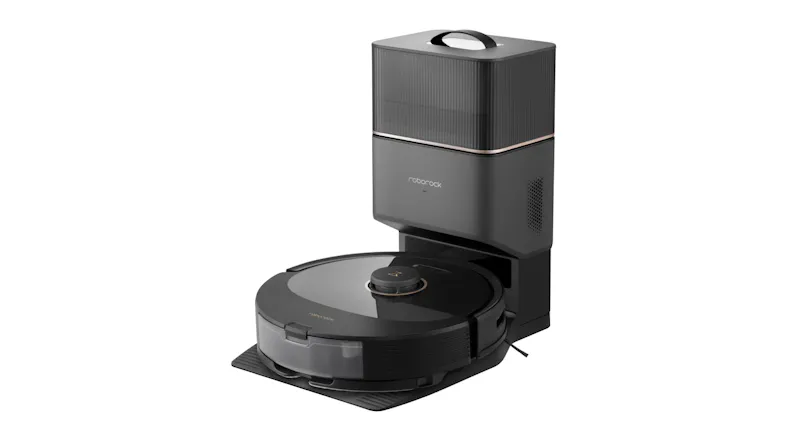 An angled view of a black robot vacuum docked at a tall, self-emptying base station An angled view of a black robot vacuum docked at a tall, self-emptying base station