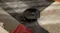 Robot vacuum cleans on a patterned rug, demonstrating smooth movement across carpeted surfaces Robot vacuum cleans on a patterned rug, demonstrating smooth movement across carpeted surfaces