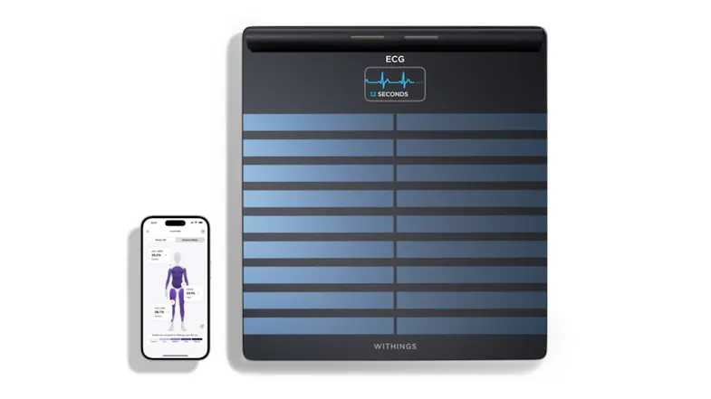 The Body Scan Scale next to a smartphone The Body Scan Scale next to a smartphone