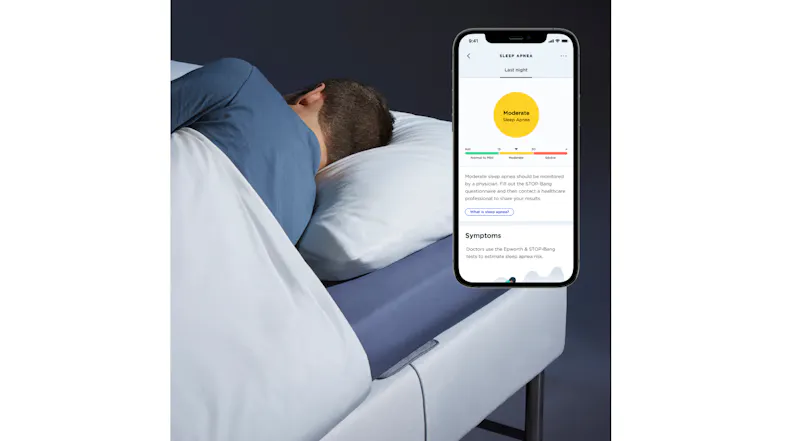 Man sleeping in bed with the Health Mate app, showing modern sleep apnea risk and symptoms assessment Man sleeping in bed with the Health Mate app, showing modern sleep apnea risk and symptoms assessment