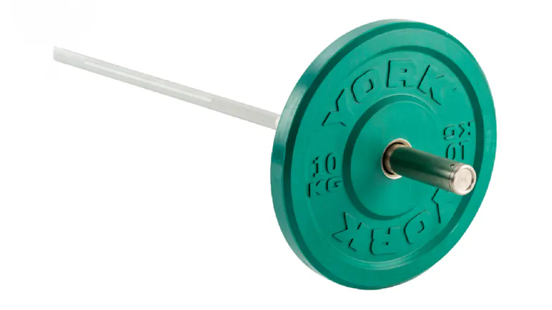 An angled view of a York solid rubber bumper plate loaded onto a silver Olympic barbell An angled view of a York solid rubber bumper plate loaded onto a silver Olympic barbell