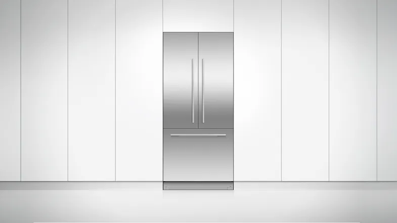 A view of the fridge freezer installed flush on a clean white wall A view of the fridge freezer installed flush on a clean white wall