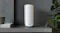 A front-angled Netgear Orbi RBE970 BE27000 Quad-Band Mesh Wi-Fi 7 sits centred on a dark grey stone shelf. A front-angled Netgear Orbi RBE970 BE27000 Quad-Band Mesh Wi-Fi 7 sits centred on a dark grey stone shelf.