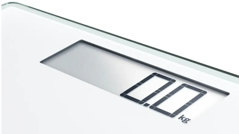 Modern white bathroom scale with LCD and rounded edges Modern white bathroom scale with LCD and rounded edges