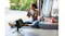 Shark FlexBreeze pedestal fan cooling an outdoor seating area with a dog resting beside a seated person Shark FlexBreeze pedestal fan cooling an outdoor seating area with a dog resting beside a seated person
