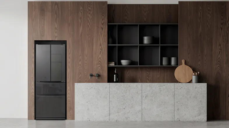Stylish kitchen with wood and stone finishes showcasing a fridge in glass gunmetal finish integrated into cabinetry Stylish kitchen with wood and stone finishes showcasing a fridge in glass gunmetal finish integrated into cabinetry