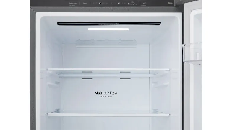 Close-up of fridge interior showing “Multi Air Flow” cooling system and adjustable glass shelves Close-up of fridge interior showing “Multi Air Flow” cooling system and adjustable glass shelves