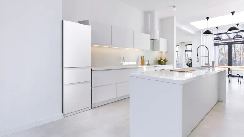 The unit displayed in a clean white modern kitchen setup The unit displayed in a clean white modern kitchen setup