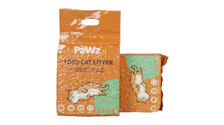 PaWz tofu cat litter packaging in orange with green pellets and an illustrated cat design, showing two bags standing together PaWz tofu cat litter packaging in orange with green pellets and an illustrated cat design, showing two bags standing together