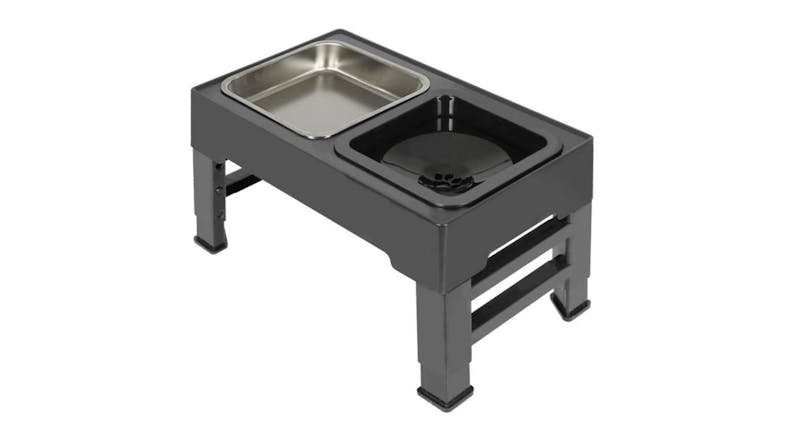 Angled view of a PaWz adjustable elevated pet feeder stand, featuring two bowls—one stainless steel and one black plastic—on adjustable legs Angled view of a PaWz adjustable elevated pet feeder stand, featuring two bowls—one stainless steel and one black plastic—on adjustable legs