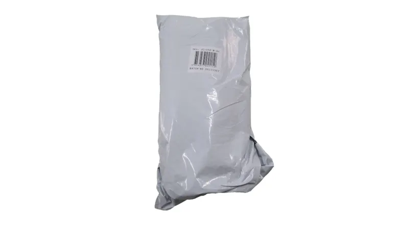 A sealed white plastic shipping bag containing the item. A sealed white plastic shipping bag containing the item.