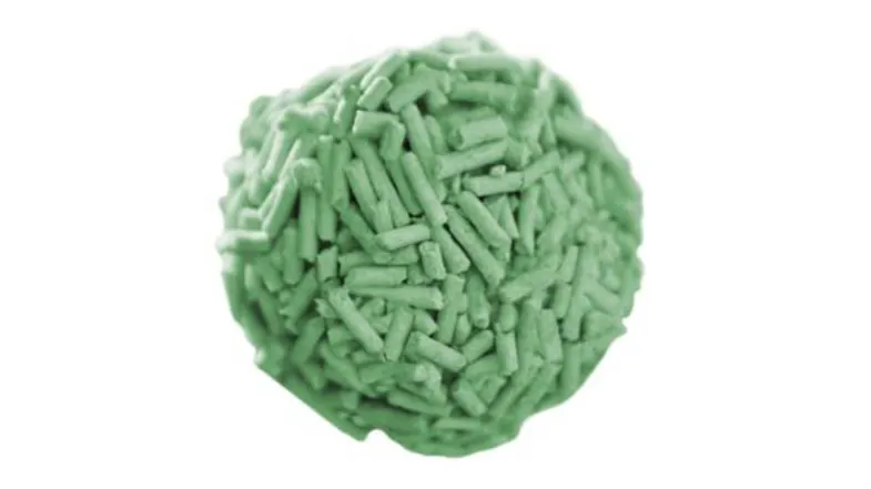 A pile of green tofu cat litter pellets is shown in a close-up angle, highlighting pellet size, texture, and colour A pile of green tofu cat litter pellets is shown in a close-up angle, highlighting pellet size, texture, and colour
