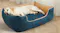 Large dog lying comfortably on the PaWz plush pet bed, demonstrating the thick cushioning and supportive bolstered sides Large dog lying comfortably on the PaWz plush pet bed, demonstrating the thick cushioning and supportive bolstered sides