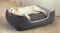 Large dog lying comfortably on the PaWz plush pet bed, demonstrating the thick cushioning and supportive bolstered sides Large dog lying comfortably on the PaWz plush pet bed, demonstrating the thick cushioning and supportive bolstered sides
