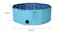 Light blue folding pet pool fully assembled, with measurements showing its 160cm width and 30cm height Light blue folding pet pool fully assembled, with measurements showing its 160cm width and 30cm height