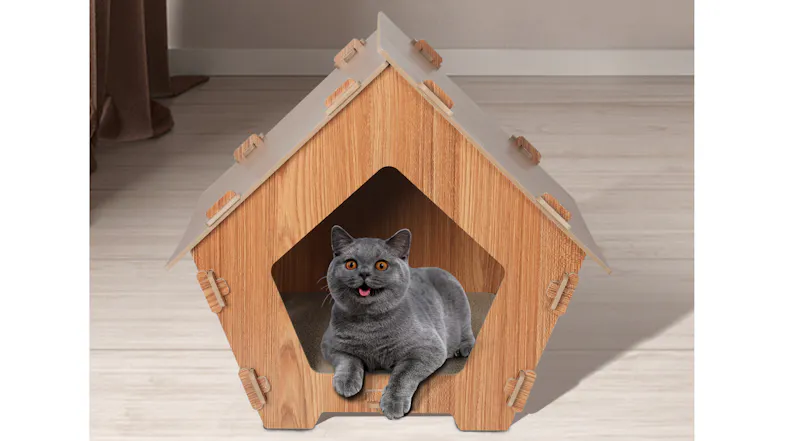 Grey cat resting inside a wooden indoor cat house with a slanted roof and a scratch pad floor Grey cat resting inside a wooden indoor cat house with a slanted roof and a scratch pad floor