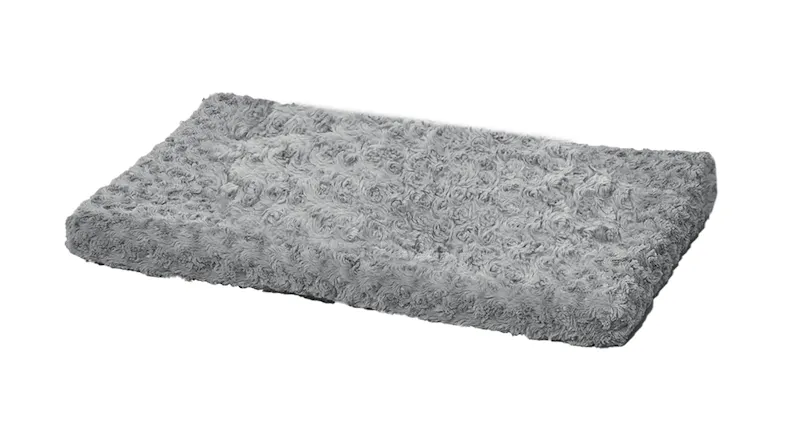 Soft grey fluffy pet sleeping mat with textured swirled fur pattern Soft grey fluffy pet sleeping mat with textured swirled fur pattern