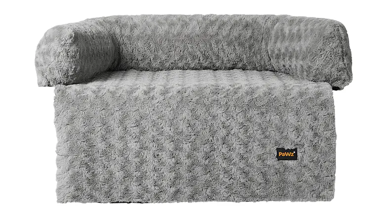 Grey textured sofa cover with a raised bolster along the back and sides Grey textured sofa cover with a raised bolster along the back and sides