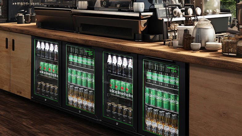 Several Husky bar fridges installed under a café counter, filled with assorted beverages Several Husky bar fridges installed under a café counter, filled with assorted beverages
