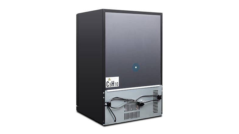 A diagonal rear view of the bar fridge showing the back panel and the metal compressor housing A diagonal rear view of the bar fridge showing the back panel and the metal compressor housing