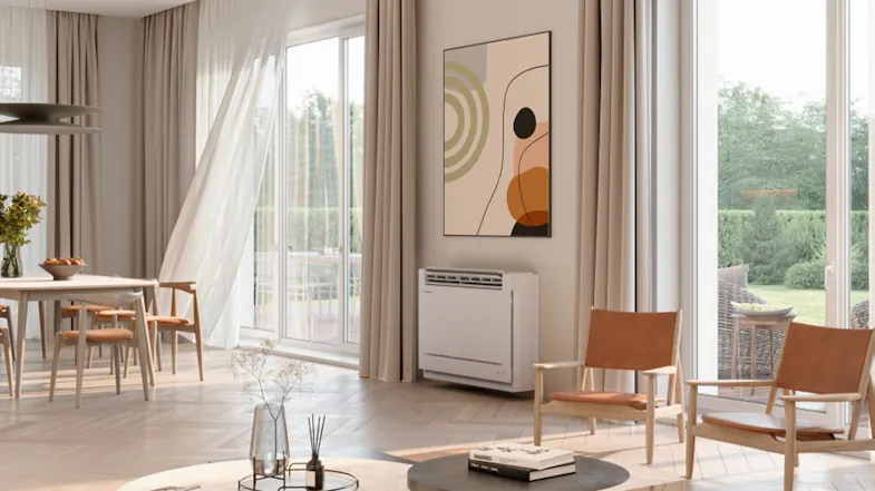 A living and dining area with a wooden chair, a round coffee table with decorative items, and a white floor console air conditioner A living and dining area with a wooden chair, a round coffee table with decorative items, and a white floor console air conditioner