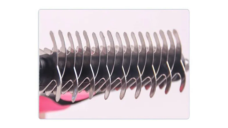 A close‑up view of stainless‑steel curved blades on a deshedding grooming tool A close‑up view of stainless‑steel curved blades on a deshedding grooming tool