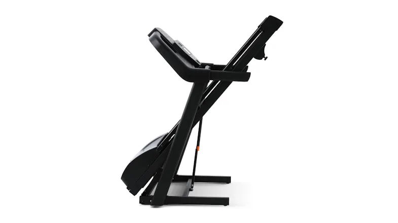 Home fitness treadmill in upright folded position with integrated console and storage-ready design Home fitness treadmill in upright folded position with integrated console and storage-ready design
