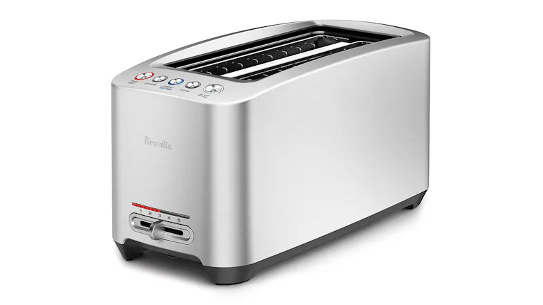 Angled three-quarter view showing the toaster’s brushed aluminium finish and elongated dual slots Angled three-quarter view showing the toaster’s brushed aluminium finish and elongated dual slots