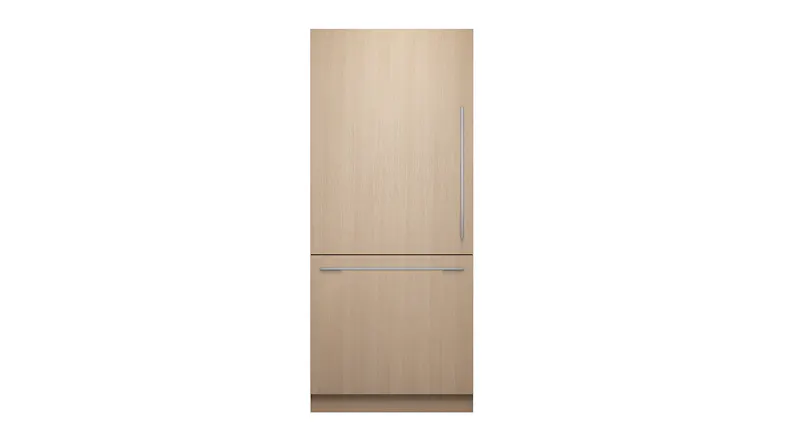 A wood-panelled fridge freezer with top and bottom door handles A wood-panelled fridge freezer with top and bottom door handles