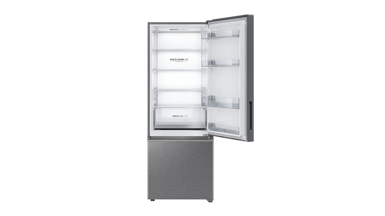 Haier 334L fridge with the top door open, highlighting its multiple shelves Haier 334L fridge with the top door open, highlighting its multiple shelves