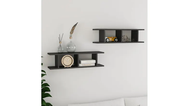Styled living room scene with two floating ladder shelves mounted on a wall above a sideboard Styled living room scene with two floating ladder shelves mounted on a wall above a sideboard