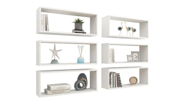 NNEVL floating wall shelf styled with books and a decorative vase NNEVL floating wall shelf styled with books and a decorative vase