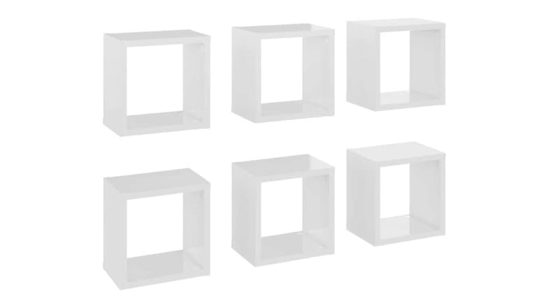 Angled view of six floating cube wall shelves in gloss white, shown in two rows Angled view of six floating cube wall shelves in gloss white, shown in two rows