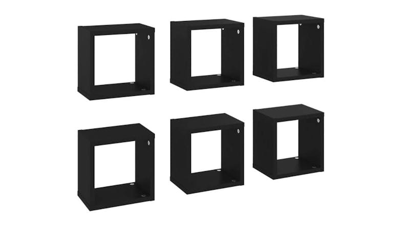 Angled view of six floating cube wall shelves in black, shown in two rows Angled view of six floating cube wall shelves in black, shown in two rows