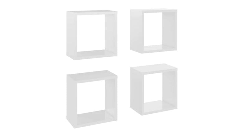 Four floating cube wall shelves in white, shown in two rows Four floating cube wall shelves in white, shown in two rows