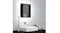Mirror cabinet mounted above a sink, emitting a bright white backlit glow Mirror cabinet mounted above a sink, emitting a bright white backlit glow