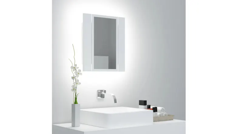 Mirror cabinet mounted above a sink, emitting a bright white backlit glow Mirror cabinet mounted above a sink, emitting a bright white backlit glow
