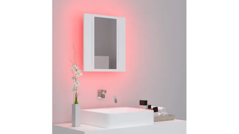 Bathroom scene featuring the mirror cabinet with a vibrant pink backlight Bathroom scene featuring the mirror cabinet with a vibrant pink backlight