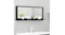 Close-up of the mirror installed above a sink, showing the gloss black frame, bottom shelf, and several soap dispensers Close-up of the mirror installed above a sink, showing the gloss black frame, bottom shelf, and several soap dispensers