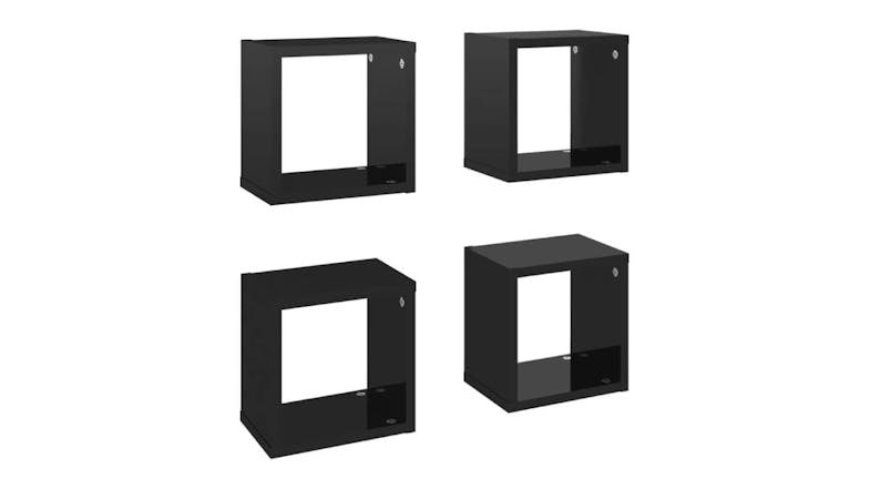 Angled view of four floating cube wall shelves in gloss black, shown in two rows Angled view of four floating cube wall shelves in gloss black, shown in two rows