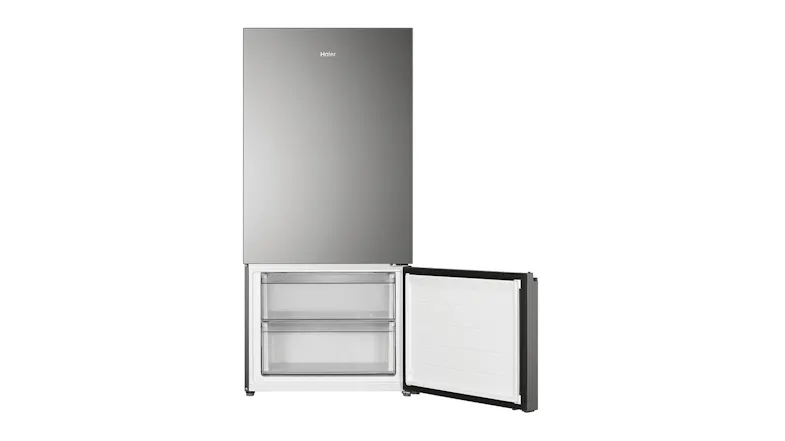 Haier Satina fridge with the bottom freezer door open, showing two large transparent storage bins Haier Satina fridge with the bottom freezer door open, showing two large transparent storage bins