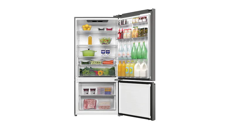 Fully stocked Haier 517L fridge and freezer showing organized food, drinks, and fresh produce Fully stocked Haier 517L fridge and freezer showing organized food, drinks, and fresh produce