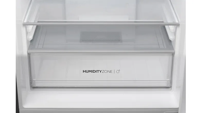 Detailed view of the specialised Humidity Zone crisper drawer inside the Haier 500 Series fridge freezer Detailed view of the specialised Humidity Zone crisper drawer inside the Haier 500 Series fridge freezer