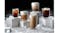 Five coffee drinks in clear glasses arranged on white blocks Five coffee drinks in clear glasses arranged on white blocks