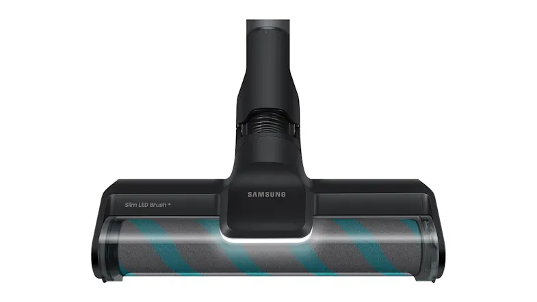 LED‑lit vacuum brush head showing a wide soft roller for dust pickup on hard floors LED‑lit vacuum brush head showing a wide soft roller for dust pickup on hard floors